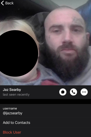 Screenshot of a Telegram profile page for "Jaz Searby" (@jazsearby), showing status "last seen recently." Profile picture displays a close-up of a bald man with a full dark beard and visible facial tattoos. Interface options include camera, phone, and menu icons, plus buttons for "Add to Contacts" and "Block User."